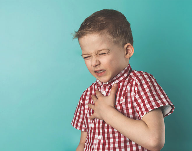 child holding chest